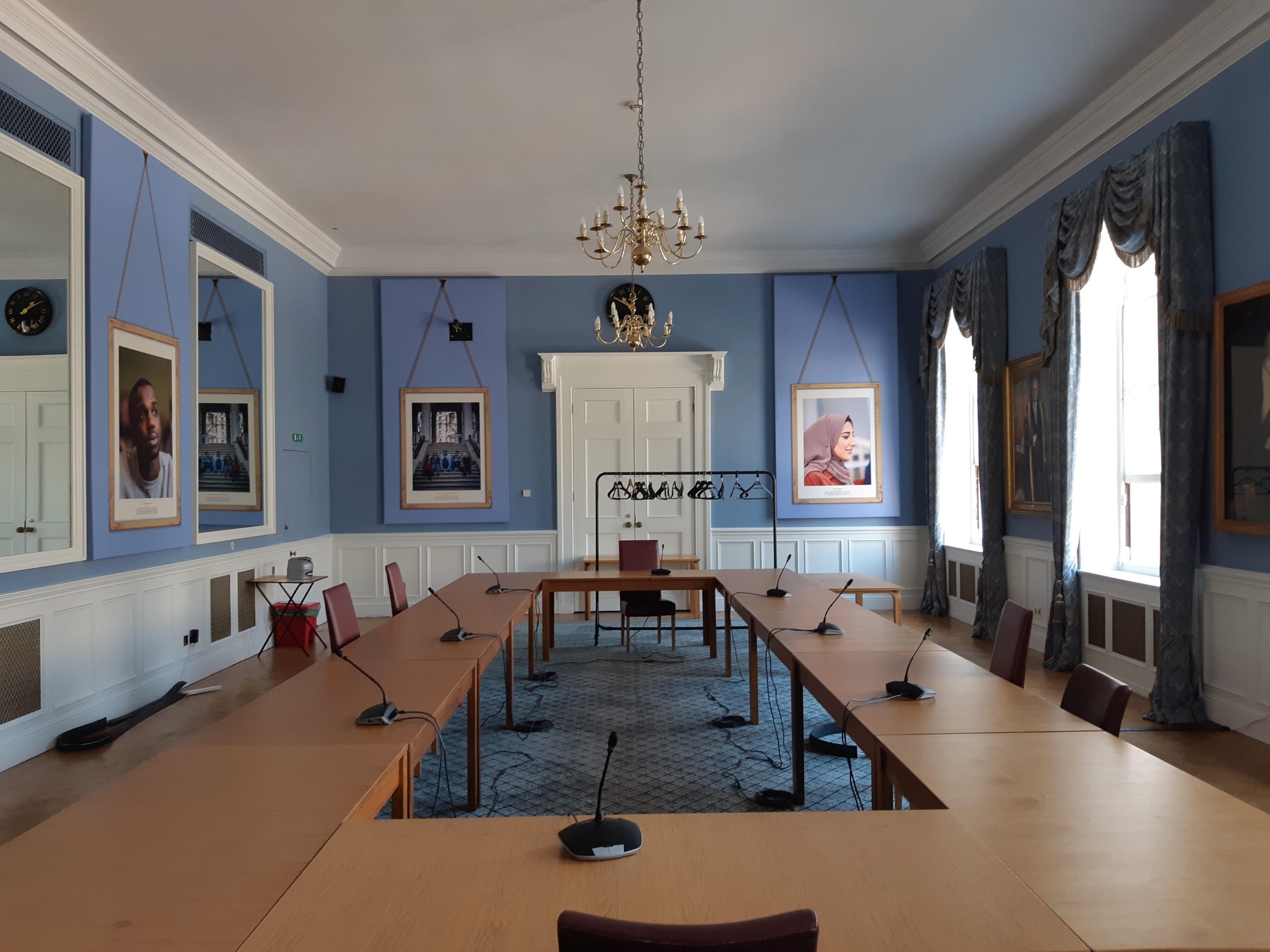 Image of the council room set up for a committee meeting.