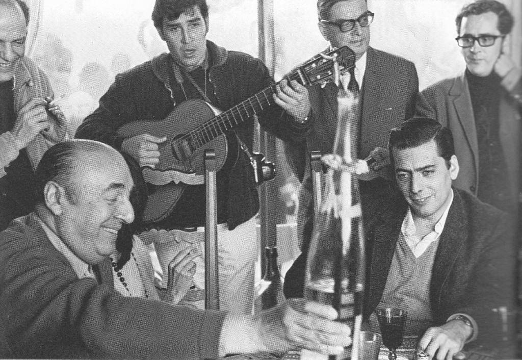 Figure 1: Pablo Neruda, Mario Vargas Llosa (seated), with Roger Caillois and Angel Rama (standing on the right), at a literary meeting at Vina de Mar (1969)