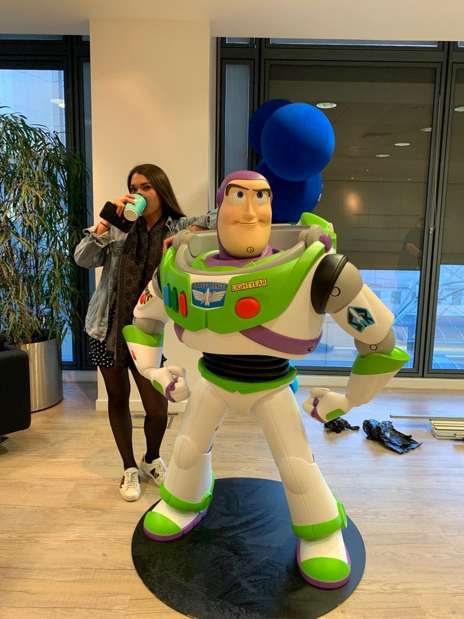 Image of Buzz Lightyear statue and Fio