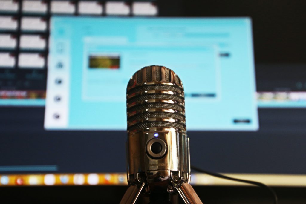 Image of mic in front of a laptop