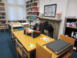 Intern studying in Special Collections reading room