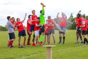 BA celebrate lifting the Hulme Cup