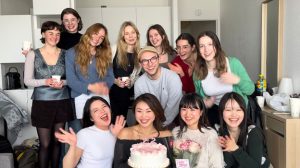 Hinano and her friends in a kitchen on her birthday 