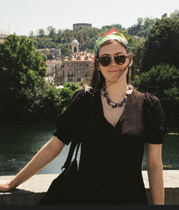 Image of Rosa standing on a bridge